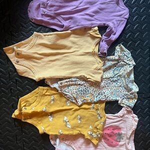 Bundle of girl leaning Carter’s Bodysuits/onesies in Purple, Yellow, and Pink